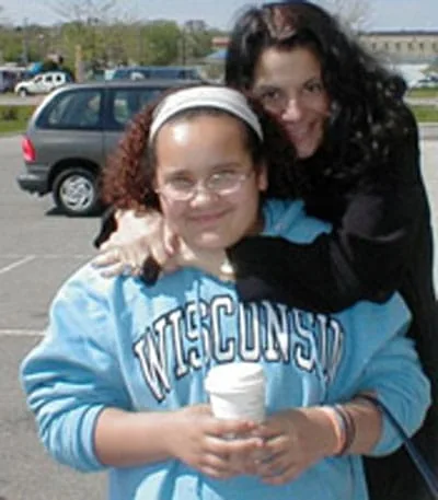 Jodee Blanco with a young girl